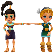 Freya in her Viking Outfit fist bumping Jasmine in her Ankh Outfit