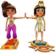 Amira surfing on Jewelled high fiving Jasmine surfing on Scarab