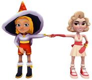Freya in her Winter Magic Outfit fist bumping Vivienne in her Hollywood Glam Outfit