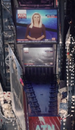 Live broadcast of ATN News on screens in Times Square, New York City.