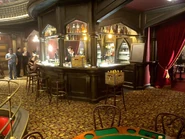 The bar at the back of the Paradise Theater in the brothel.