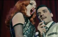 Tumblr lolc3wxUTZ1qhb2cd.jpg (45 KB) Vera with Blue, singing "Love is the Drug."