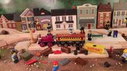 Lewis at Tidmouth Beach, along with Lady and The Duke and Duchess of Boxford