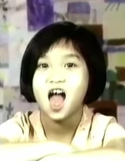 Brenda as she appears in the 1996 game show, Small Talk.