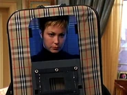 Carey as Luggage Bag