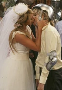 Maddie on her wedding day and zack is lucky to get a kiss before her groom Prince Jiffy