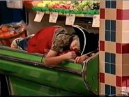 Zack sleeping on a bag of potatoes