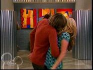 Trevor making out with Maddie in the museum