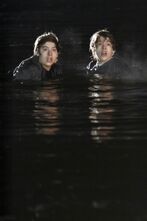 Zack and Cody in a lake, upon notice of more mind-controlled twins.