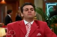 Esteban in a suit