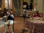 Cody practicing French horn sorrowfully