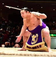 Satonofuji performs the bow-twirling ceremony (c. 2018)