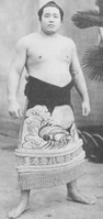 Tamanoumi with his kesho-mawashi