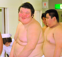 Orora gets measured upon joining professional sumo (c. 2000)