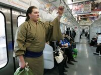 Masutoo takes the subway to the Kokugikan (c. 2006)