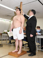 Shiraishi gets measured upon joining professional sumo (c. 2019)