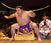 Minanosato performs the bow-twirling ceremony (c. 2009)