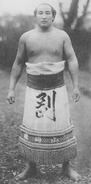 Orochigata poses with his kesho-mawashi