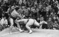 Ryuko defeats Yokozuna Kitanoumi to earn his second kinboshi (c. 1974)