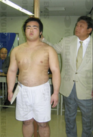 Shosei gets measured upon joining professional sumo (c. 2005)