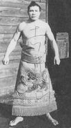 Yoshiiyama poses with his kesho-mawashi