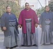 Yamanakayama (left) celebrates promotion to juryo (c. 1992)