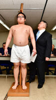 Kurohimeyama gets measured upon joining sumo (c. 2018)