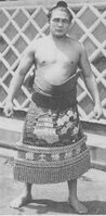 Matsumaeyama poses with his kesho-mawashi