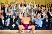 Mitakeumi celebrates his first Yusho (c. 2018)