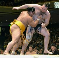 Shohozan defeats former Ozeki Kotooshu (c. 2014)