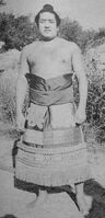 Misogidori poses with his kesho-mawashi (c. 1967)