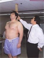 Kokkai gets measured upon joining professional sumo (c. 2001)