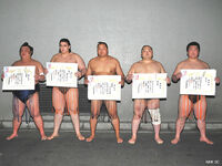 Sasakiyama (far right) wins the Jonokuchi Yusho (c. 2010)