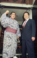 Saigo celebrates promotion to Juryo (c. 1995)