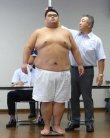 Kazuma gets measured upon joining professional sumo (c. 2024)