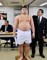 Takakento gets measured upon joining professional sumo (c. 2014)