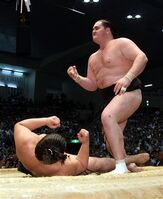 Wakanoho celebrates after defeating Ama (c. 2008)