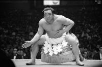 Tochinoumi performs the Yokozuna dohyo-iri (c. 1965)