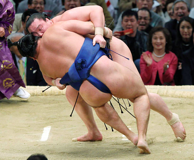 Rehabilitated sumo wrestler repays stablemaster with 1st