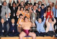 Mitakeumi celebrates his second Yusho (c. 2019)