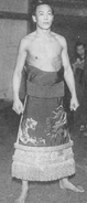 Toyonishiki poses with his kesho-mawashi