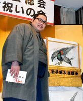 Nishikigi presented with his new kesho-mawashi (c. 2019)