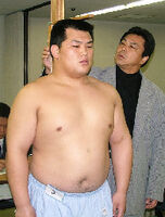 Shimoda gets measured upon joining professional sumo (c. 2006)