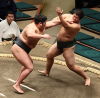 Kokiryu battles Takerufuji in Maezumo (c. 2022)
