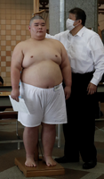 Shotaimu gets measured upon joining professional sumo (c. 2021)