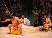 Takamiwaka performs the bow-twirling ceremony (c. 1993)