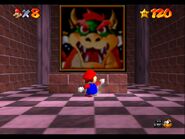 Mario in front of the entrance to the third and final Bowser level.