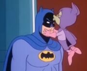 Bat-Mite kissing Batman