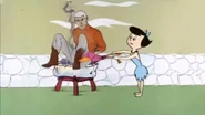 Betty Rubble cooking Race Bannon