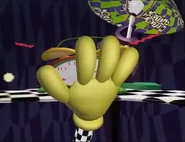 A hand shutting of an alarm clock